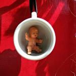 Odd Surreal details abound - Babe in Cup